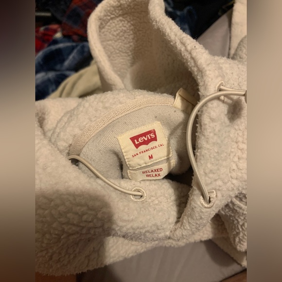 this is a Beige Levi’s Sherpa, very comfortable with no rips or tears, very warm - Picture 2 of 4
